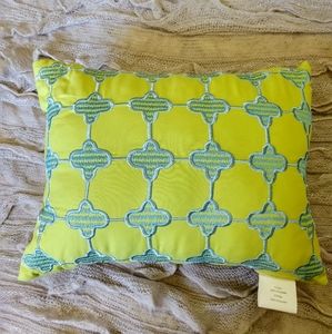 Blue and green embroidered throw pillow